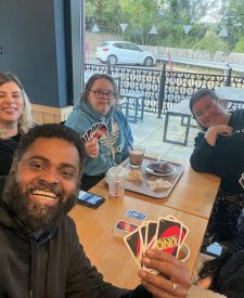 Ebonie Adam and co playing Uno