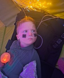Evan at Sensory playtime after a busy morning at Sunday club and a walk to the park