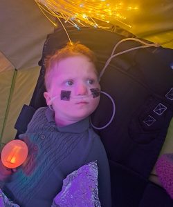 Evan at Sensory playtime after a busy morning at Sunday club and a walk to the park